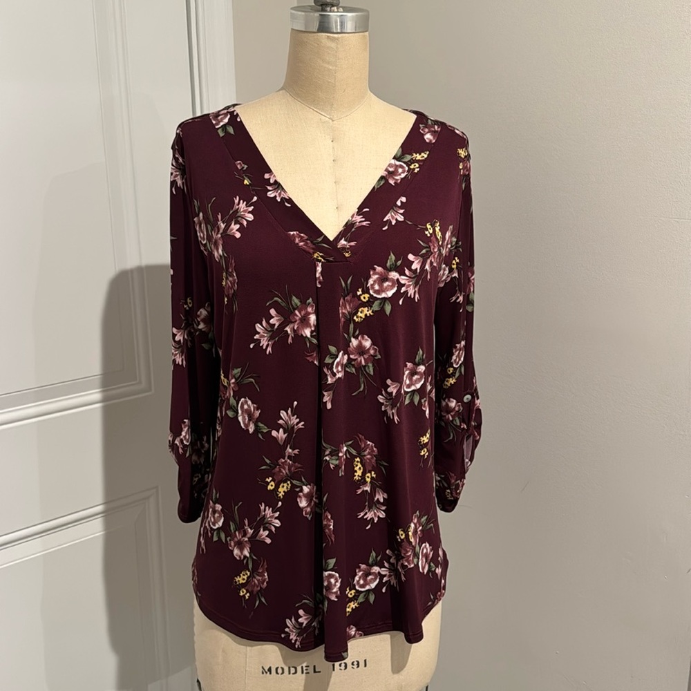 Floral v neck top with roll sleeves